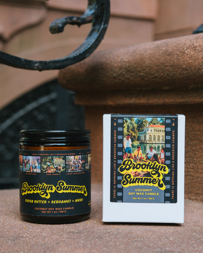 Brooklyn Summer candle and packaging on a textured surface