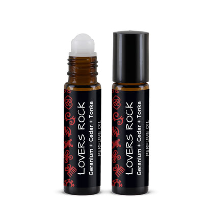 Two roller bottles of 'Lovers Rock' perfume oil on a white background