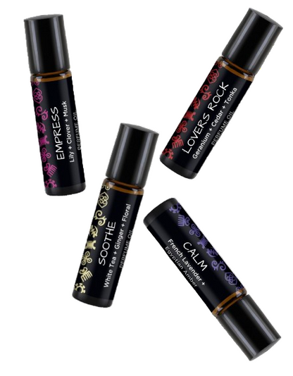 Four black rollerball bottles with labels on a white background